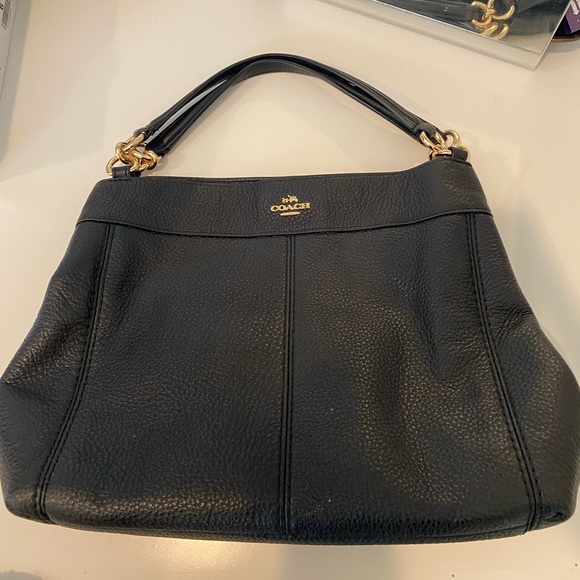 Black coach bag. Comes with crossbody strap. - Picture 1 of 4